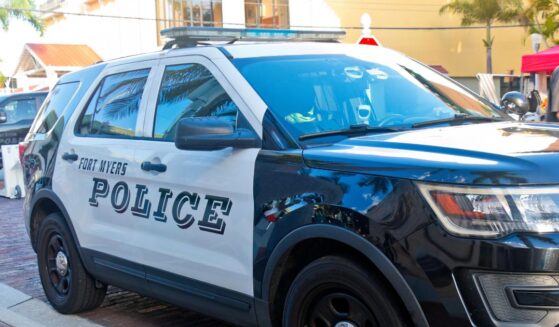 Police cars from the Fort Myers Florida Police Department secure the downtown district for a festival on Oct. 6, 2023.