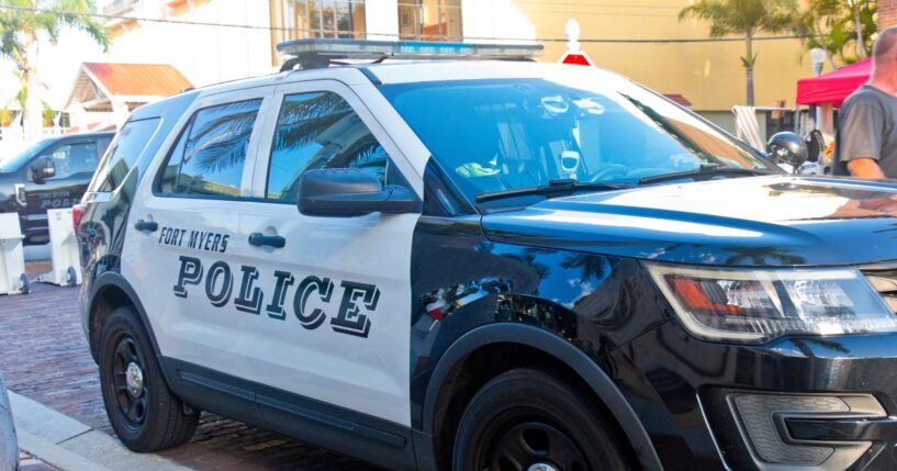 Police cars from the Fort Myers Florida Police Department secure the downtown district for a festival on Oct. 6, 2023.