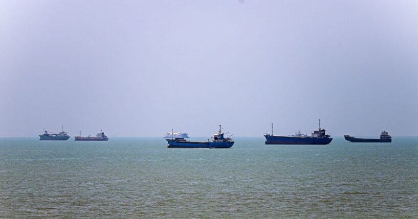 In this picture obtained from Iran's ISNA news agency on June 18, 2026, vessels are seen anchored in Bandar Abbas along the Strait of Hormuz.
