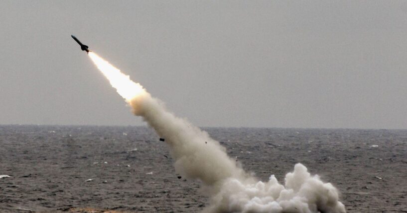 A Chinese submarine launches a missile in an offshore blockade exercise during the third phase of the Sino-Russian "Peace Mission 2005" joint military exercise, held Aug. 23, 2005, near China's Shandong Peninsula.