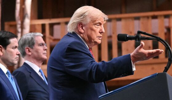 President Donald Trump gestures as he addresses the media alongside Secretary of State Marco Rubio and Secretary of Treasury Scott Bessent during a closing press conference at the G7 summit, in Evian, eastern France, on June 17, 2026.