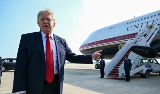 President Donald Trump speaks to the press before he boards Air Force One for his first flight aboard the Boeing 747-8 that Qatar gifted the United States to use for executive travel, at Joint Base Andrews, in Maryland, July 1, 2026.