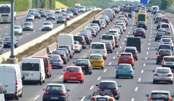 A traffic jam on a four-lane highway at rush hour.