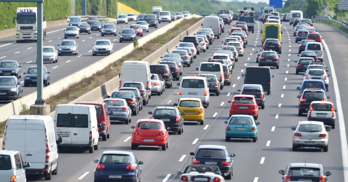 A traffic jam on a four-lane highway at rush hour.