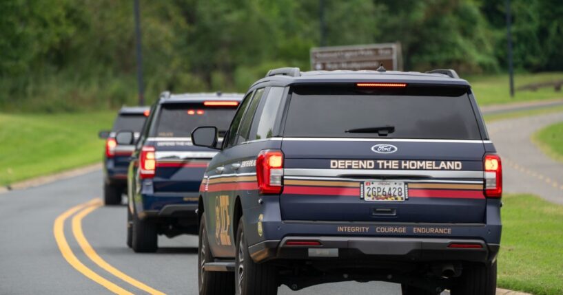 Immigration and Customs Enforcement agents in newly designed vehicles arrive ahead of a scheduled speech by President Donald Trump at the Park Police Anacostia Operating Facility on Aug. 21, 2025, in Washington, D.C.