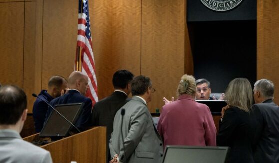 Tyler Robinson, who is accused in the fatal shooting of Charlie Kirk, sits while Judge Tony Graf conferences with attorneys during a preliminary hearing at the Fourth District Courthouse on July 9, 2026, in Provo, Utah.