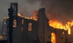 The Altadena Community Church burns during the Eaton Fire on Jan. 8, 2025, in the Altadena section of Pasadena, California.