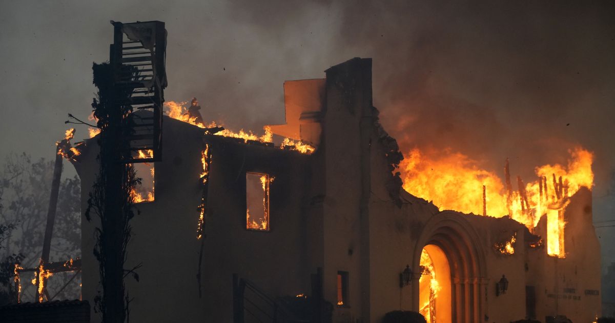 The Altadena Community Church burns during the Eaton Fire on Jan. 8, 2025, in the Altadena section of Pasadena, California.