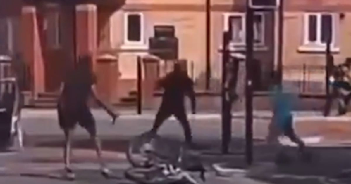 A brawl between five men with machetes unfolded in Manchester, England, as shown by video footage posted on July 13, 2026.