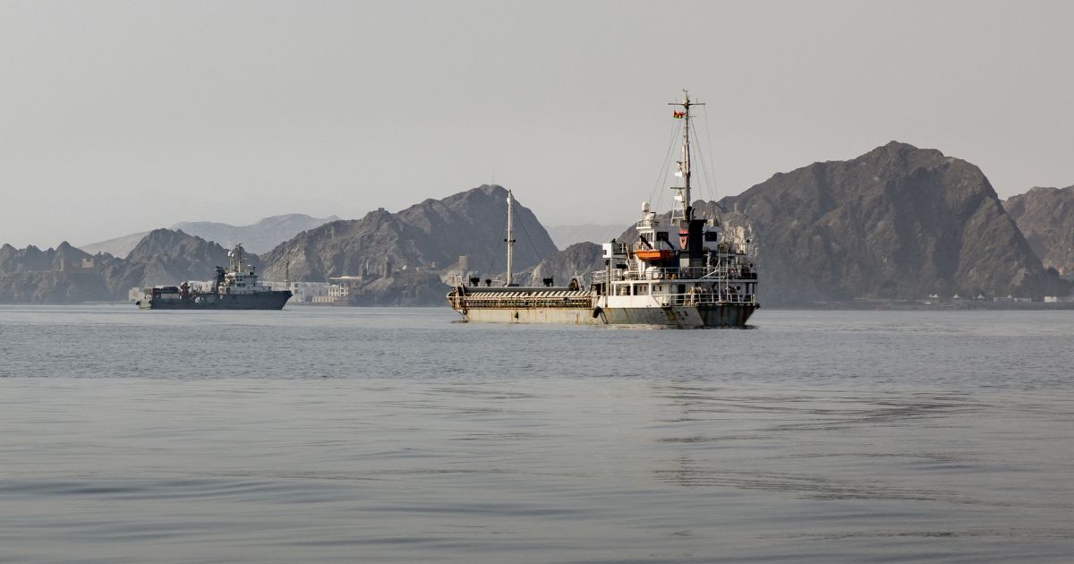 Cargo vessels remain anchored off Port Sultan Qaboos on June 20, 2026, in Muscat, Oman.