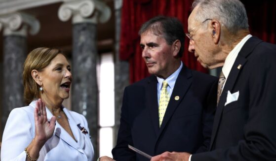 Sen. Darline Graham Nordone participates in a ceremonial swearing-in with Sen. Chuck Grassley as her husband Larry Nordone looks on in the Old Senate Chamber at the U.S. Capitol on July 14, 2026, in Washington, D.C.