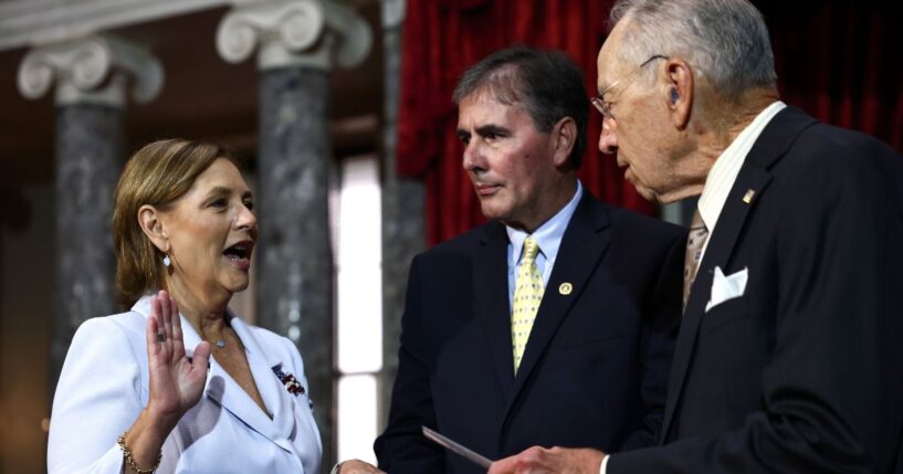 Sen. Darline Graham Nordone participates in a ceremonial swearing-in with Sen. Chuck Grassley as her husband Larry Nordone looks on in the Old Senate Chamber at the U.S. Capitol on July 14, 2026, in Washington, D.C.