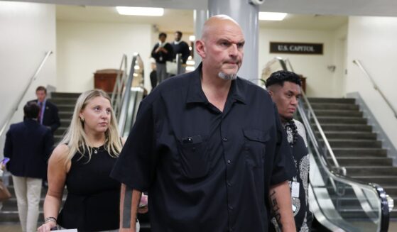 Sen. John Fetterman walks through the Senate Subway during a vote in the U.S. Capitol Building on Oct. 1, 2025, in Washington, D.C.