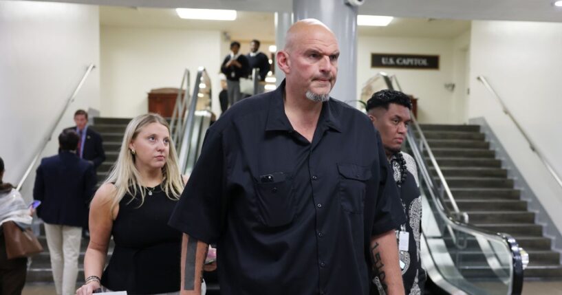 Sen. John Fetterman walks through the Senate Subway during a vote in the U.S. Capitol Building on Oct. 1, 2025, in Washington, D.C.
