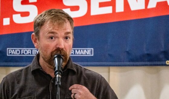 Graham Platner, the embattled Democratic nominee for Senate in Maine, speaks to campaign supporters in a June 7 file photo.
