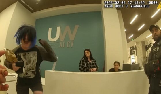 A transgender man sceams during a confrontation with police at the University of Central Florida in February 2025.