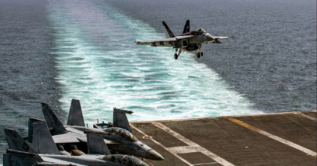 A Navy F/A 18E Super Hornet lands on the USS Abraham Lincoln in a file photo from the outbreak of Operation Epic Fury, the U.S. attack on Iran in February.