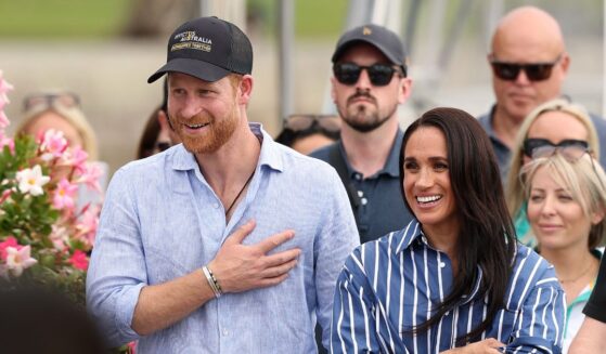 Prince Harry, Duke of Sussex and Meghan, Duchess of Sussex greet members of the public at the Cruising Yacht Club of Australia on April 17, 2026, in Sydney, Australia.