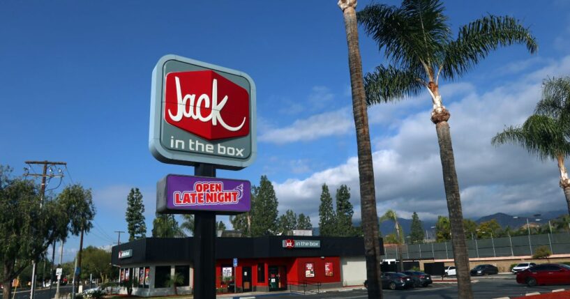 A storefront for a Jack in the Box Restaurant as seen from sidewalk along Historical Route 66 in Azusa, California.