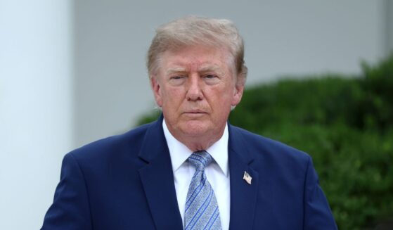 President Donald Trump speaks with guests during an event announcing the expansion of a foster care initiative in the Rose Garden of the White House on Aug. 20, 2026, in Washington, D.C.