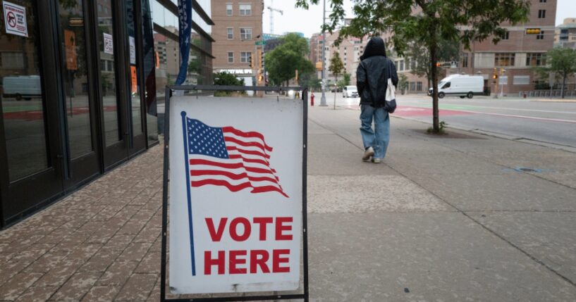 A sign marks the location of a polling place as residents vote in the state's primary election on Aug. 11, 2026, in Madison, Wisconsin.