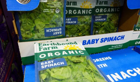 Packages of Earthbound Farm organic baby spinach are displayed for sale in the refrigerated produce department at a Costco Wholesale warehouse on July 29, 2026, in Arlington, Virginia.