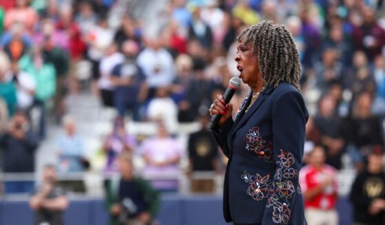 Martha Reeves sings the National Anthem before the Women's Pro Baseball League Opening Day between New York Heights and the Los Angeles Queens at Robin Roberts Stadium on Aug. 1, 2026, in Springfield, Illinois.