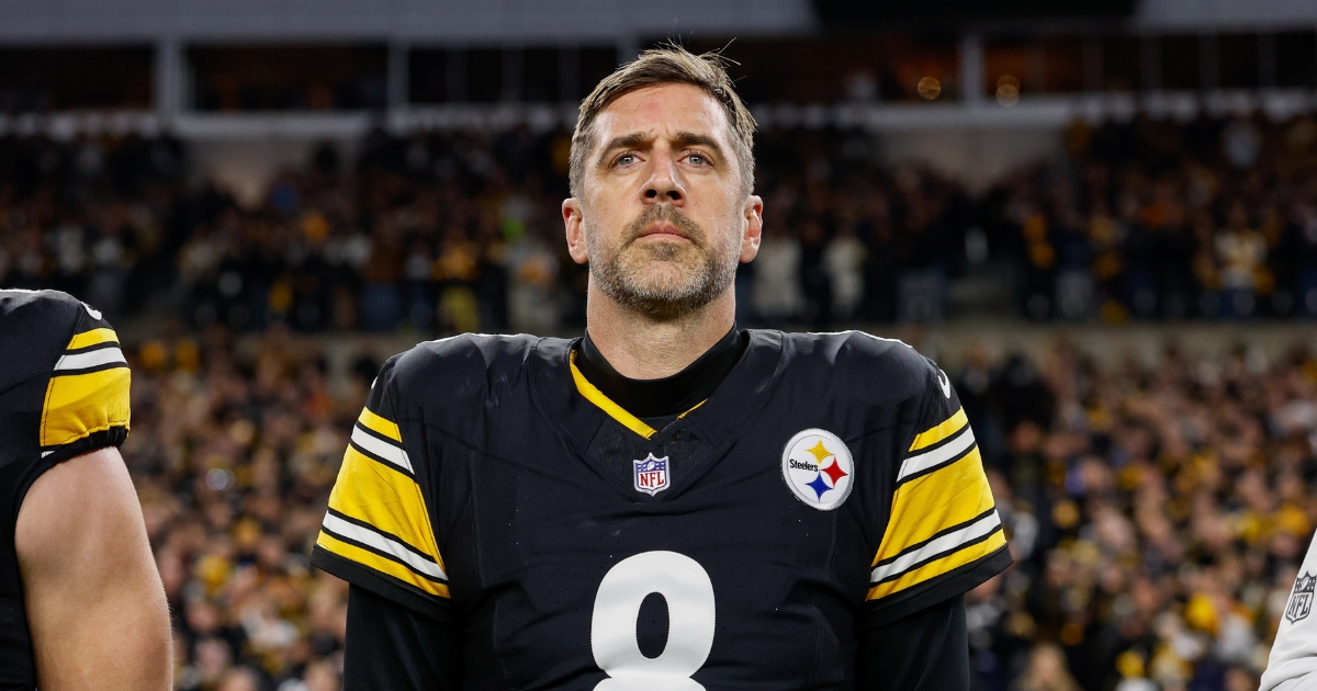 Aaron Rodgers of the Pittsburgh Steelers stands for the national anthem prior to the AFC Wild Card playoff game against the Houston Texans at Acrisure Stadium on Jan. 12, 2026, in Pittsburgh, Pennsylvania.