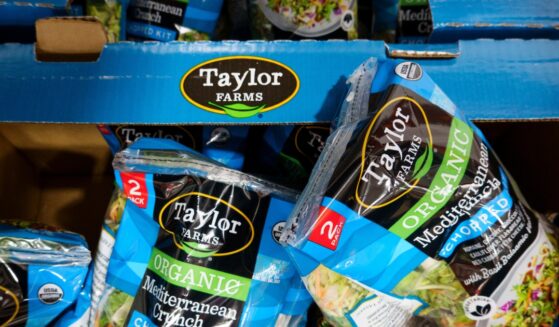 Packages of Taylor Farms Organic Mediterranean Crunch Chopped Kit salad are displayed for sale in a refrigerated section at a Costco Wholesale warehouse on July 29, 2026, in Arlington, Virginia.