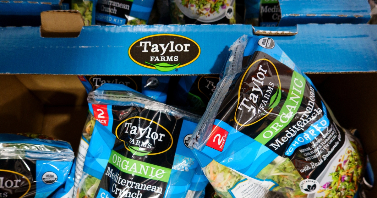 Packages of Taylor Farms Organic Mediterranean Crunch Chopped Kit salad are displayed for sale in a refrigerated section at a Costco Wholesale warehouse on July 29, 2026, in Arlington, Virginia.
