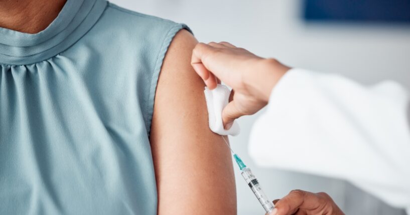 A patient receives a vaccine.
