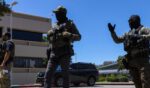 Immigration and Customs Enforcement agents stand guard outside the Ventura County Government Center in Ventura, California, on July 27, 2026.