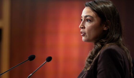 Rep. Alexandria Ocasio-Cortez speaks at a press conference to announce the Artificial Intelligence Data Center Moratorium Act at the U.S. Capitol on March 25, 2026, in Washington, D.C.