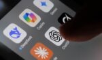 Apple iPhone screen with artificial intelligence icons in London, United Kingdom, on May 2, 2025.
