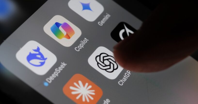Apple iPhone screen with artificial intelligence icons in London, United Kingdom, on May 2, 2025.