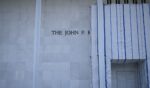 Scaffolding and a large protective tarp is covering part of the facade of the John F. Kennedy Center for the Performing Arts in Washington, D.C., on Aug. 13, 2026.