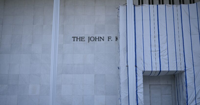 Scaffolding and a large protective tarp is covering part of the facade of the John F. Kennedy Center for the Performing Arts in Washington, D.C., on Aug. 13, 2026.