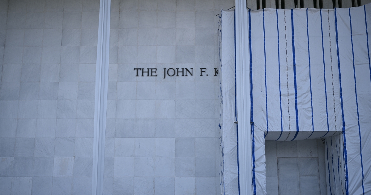 Scaffolding and a large protective tarp is covering part of the facade of the John F. Kennedy Center for the Performing Arts in Washington, D.C., on Aug. 13, 2026.