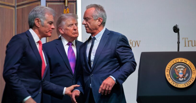 Centers for Medicare & Medicaid Services Administrator Mehmet Oz, President Donald Trump, and Health and Human Services Secretary Robert F. Kennedy Jr. hold a news conference about the government prescription drug program TrumpRx.gov in the Eisenhower Executive Office Building on May 18, 2026, in Washington, D.C.