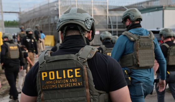 Immigration and Customs Enforcement agents block protesters as cars exit Delaney Hall, which is being used as an Immigration and Customs Enforcement detention center, on May 27, 2026, in Newark, New Jersey.