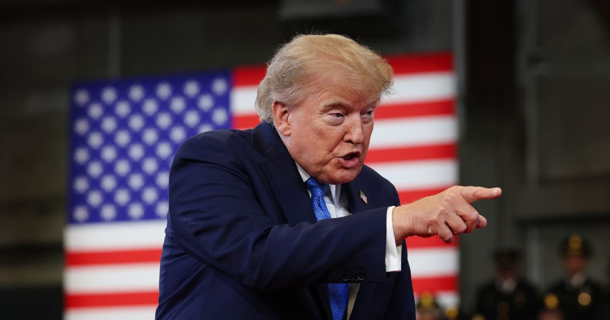 President Donald Trump arrives to deliver remarks at the David S. Mack Center for Training and Intelligence on Aug. 14, 2026, in Garden City, New York.