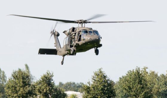 A U.S. Air Force Sikorsky UH-60 Black Hawk from the 101st Airborne Division arrives at the scene of an air attack demonstration commemorating Operation Market Garden in the Netherlands.