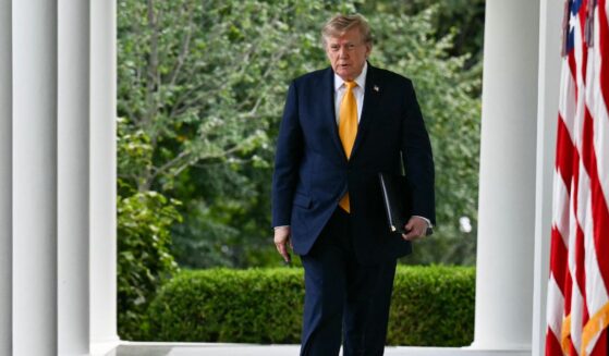 President Donald Trump arrives to speak in the Rose Garden of the White House in Washington, D.C., on Aug. 24, 2026.