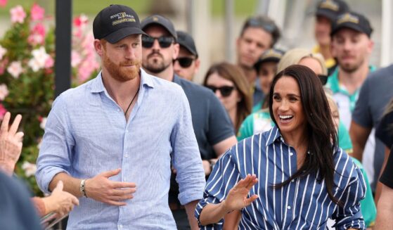 Prince Harry, Duke of Sussex, and Meghan, Duchess of Sussex greet members of the public at the Cruising Yacht Club of Australia on April 17, 2026, in Sydney, Australia.