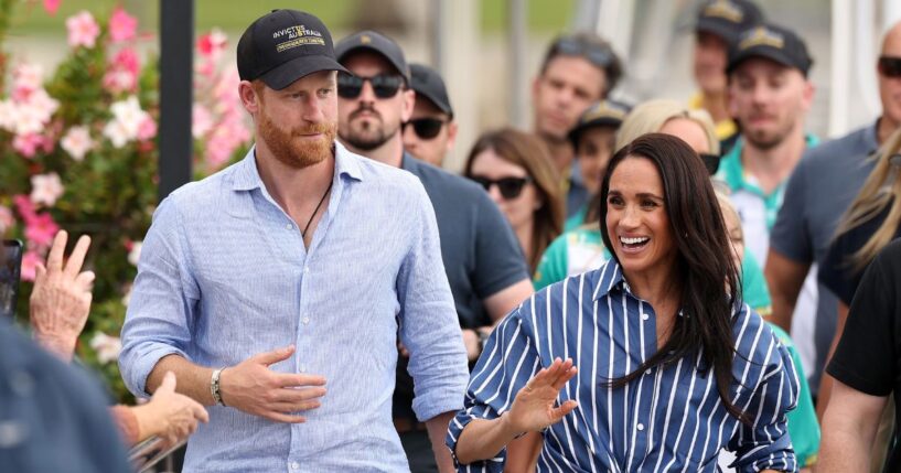 Prince Harry, Duke of Sussex, and Meghan, Duchess of Sussex greet members of the public at the Cruising Yacht Club of Australia on April 17, 2026, in Sydney, Australia.