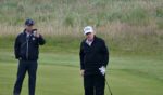 President Donald Trump looks on as he plays golf at the Trump Turnberry Golf Courses, in Turnberry on the southwest coast of Scotland on July 27, 2025, during the third day of his visit to the country, since his second tenure as President began.