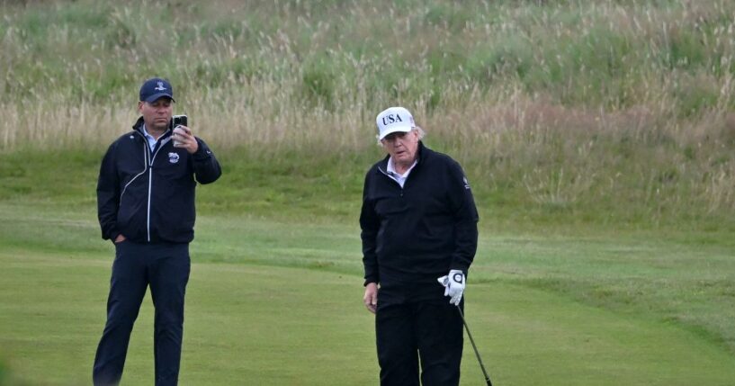 President Donald Trump looks on as he plays golf at the Trump Turnberry Golf Courses, in Turnberry on the southwest coast of Scotland on July 27, 2025, during the third day of his visit to the country, since his second tenure as President began.