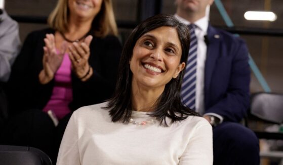 Second Lady Usha Vance listens to her husband Vice President J.D. Vance speak during a visit to the Engineering Design Services Inc. manufacturing facility in Auburn Hills, Michigan, on March 18, 2026.