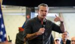 Secretary of War Pete Hegseth appears onstage at a campaign event for Republican candidate for Iowa's 3rd Congressional District Zach Nunn on day five of the Iowa State Fair on Aug. 17, 2026, in Des Moines, Iowa.