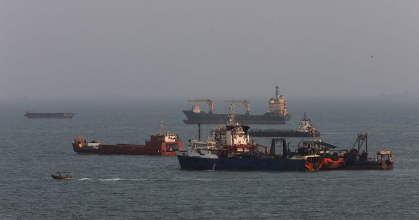 Ships are anchored in the Strait of Hormuz on Aug. 10, 2026, off the coast of Bandar Abbas, Iran.